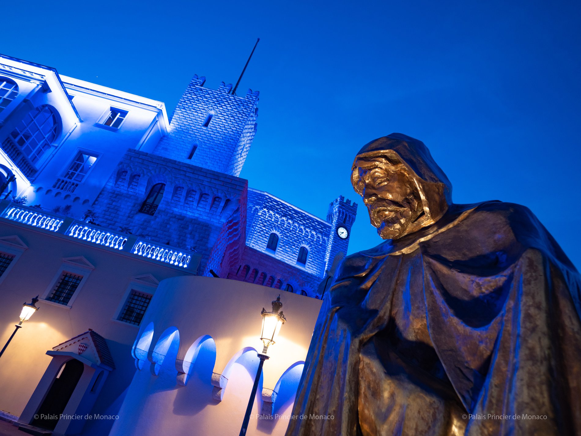 prince's palace statue light it blue covid 19